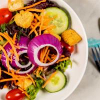 House Salad · Mixed greens, tomatoes, carrots, cucumbers, onions, and croutons.