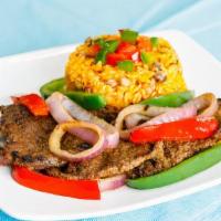 Steak & Onions · Skillet beef steak marinated and grilled in a delicious home made marinade served with saute...