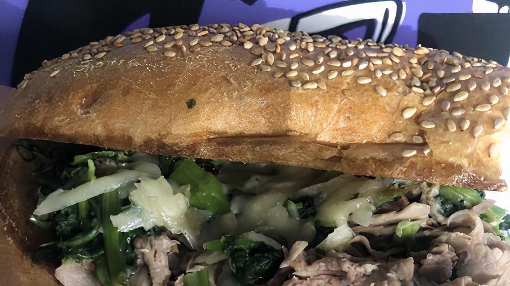 Roast Pork Sandwich **Special** · Roasted Pork from beloved Carl Venezia's, broccoli rabe, sharp provolone and a house made Long Hot Pesto all LOADED on a seeded long roll from Liscio's.