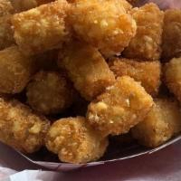 Tots-Plain · Deep-fried tater tots that are crispy and topped lightly with salt.