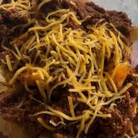 Fries-Coney · Topped with house made chili & shredded cheddar.