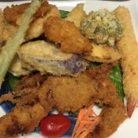 Tempura Combo · Deep fried shrimp, soft shell crab, scallop and vegetable coated with light batter. Served w...