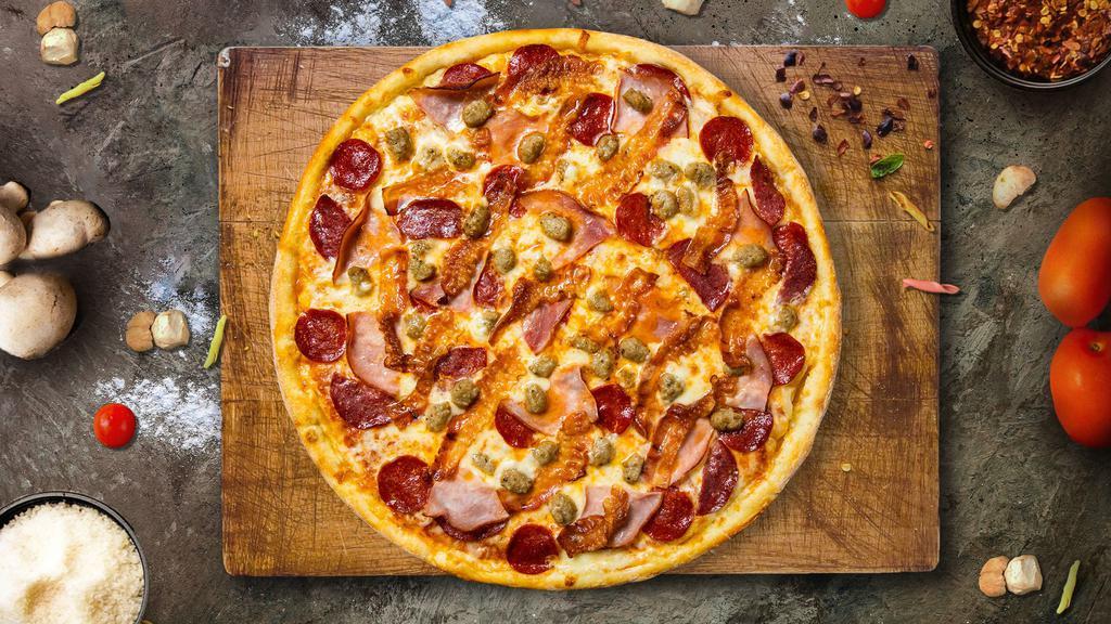 Meat Lover Pizza · Mozzarella, pepperoni, chicken, and sausage baked on a hand-tossed dough