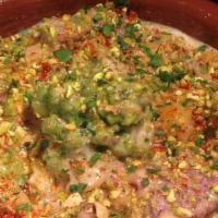 Cazuela De Coliflor Asada · Roasted cauliflower, Manchego cheese, pistachios, spicy Pimenton. . **Dairy Allergy**Allium ...