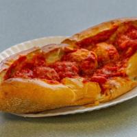 Meatball Sub (Large) · Meatball sub is served with marinara sauce, meatballs, provolone cheese.