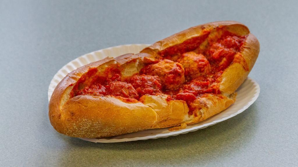 Meatball Sub (Large) · Meatball sub is served with marinara sauce, meatballs, provolone cheese.