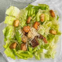 Caesar Salad · Caesar salad is served with croutons, romaine, shredded Parmesan.