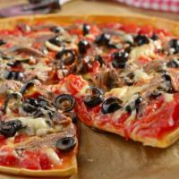 Fresh Tomato, Black Olives, Feta Cheese & Fresh Garlic Pizza · Our house made dough, made fresh daily topped with fresh tomatoes and garlic, tangy feta che...