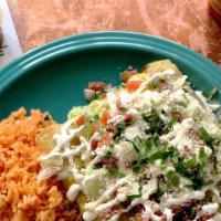 Enchiladas · Three fresh corn tortillas, choice of one filling. Salsa verde, topped with melted cheese se...