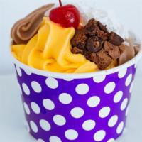 Frozen Dessert Cup 9 Oz. · 9 oz. frozen dessert + 2  Toppings.
Choice of flavor and up to 2 toppings.