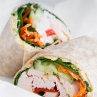 Veggie Wrap · Hummus, shredded carrots, spinach, cucumber,red pepper hummus on a whole wheat wrap