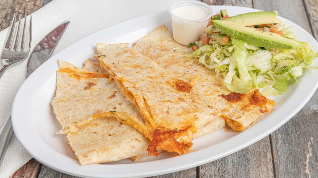 Quesadillas · Grilled flour tortilla stuffed with cheese. Topped with cream and garnished with cucumbers and radishes.
