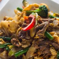 Drunken Noodles · Spicy. Wide rice noodle stir fried with egg and green vegetable in hot basil sauce.