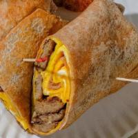 Omelette Wrap · Three eggs, choice of one meat, and cheese. Comes on a wheat wrap.
