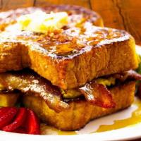 French Toast Sandwich · Your choice of Meat, Egg and Choice of Cheese between two pieces of our homemade French Toast