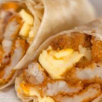 Hash Brown Burrito · Eggs, Cheese, Meat and Hashbrown's on a honey wheat wrap.