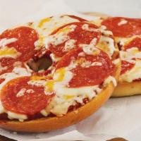 Pizza Bagels · Our Fresh baked Bagels  with Marinara and Mozzarella Cheese perfectly melted in our new pizz...