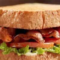 Blt Sandwich · Served with chips and a pickle. Bacon, lettuce, tomato, and mayonnaise.