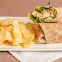 Grilled Chicken Caesar Wrap · Served with chips and a pickle. Grilled chicken, Caesar dressing, lettuce, tomato, and Parme...