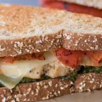 Chicken Pesto  · Grilled Chicken, Pesto, Red Roasted peppers, melted Pepper Jack, and Mozzarella on choice of...