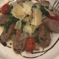 Brocoli Rabe And Sausage · Sautéed Italian mild sausage, broccoli rabe, cannellini beans In a garlic and oil, garnish w...