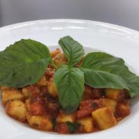 Gnocchi Pomodoro · Fresh homemade gnocchis, tomato, basil, garlic olive oil.