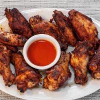 Chicken Wings · Choice of ranch, BBQ, blue cheese, or hot sauce.