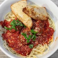 Spaghetti & Meatballs · Homemade meatballs served with marinara sauce over pasta and Parmesan cheese.