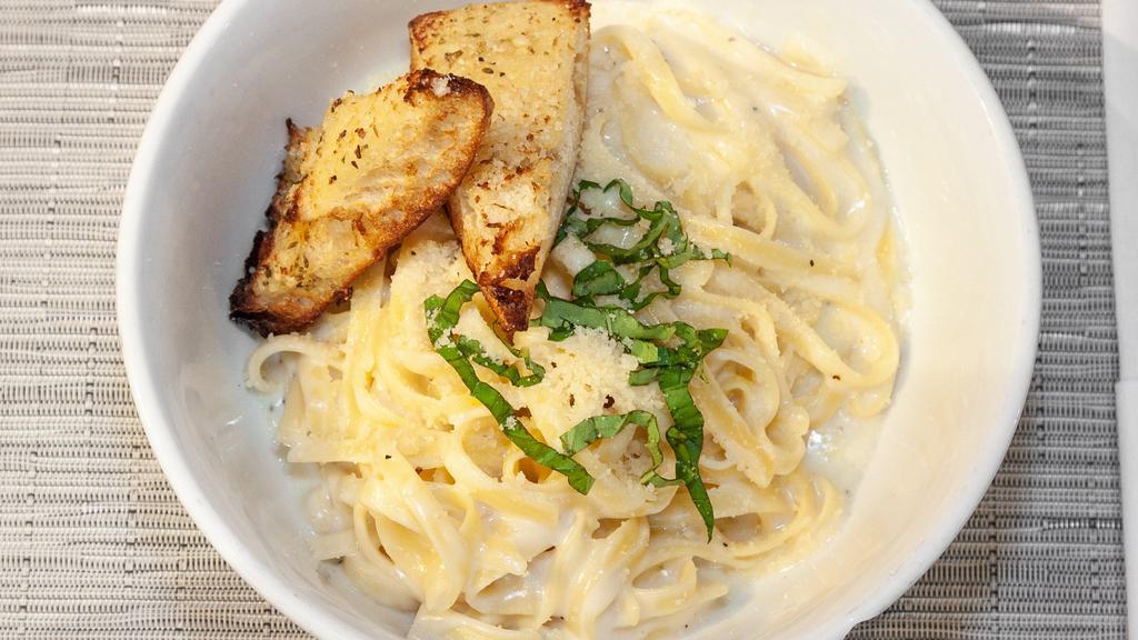 Fettuccine Alfredo · Pasta with Alfredo sauce and parmesan cheese.