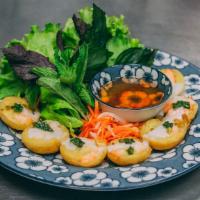 Banh Khot · Savory mini rice flour pancakes with shrimp and pork.