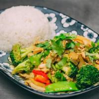 Stir Fry Curry · Broccoli, carrots,onion,bell pepper,mushrooms,baby corn,bamboo slice, wok tossed in coconut ...