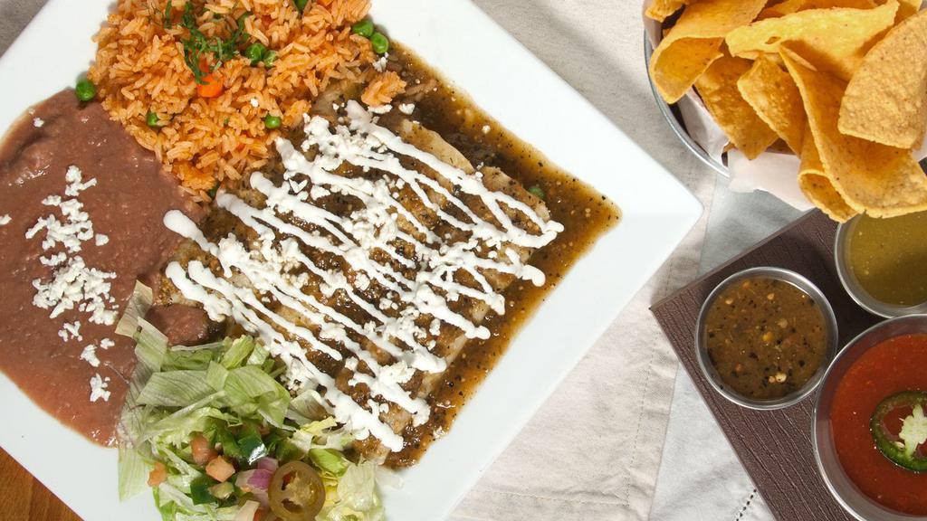 Enchiladas Verdes · Choice of steak, chicken or cheese topped with green Chile sauce, lettuce, sour cream and queso fresco.