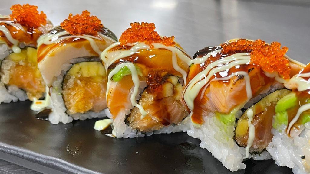 Mike'S Favorite Maki Roll · Spicy salmon and mango topped with seared salmon, white tuna, avocado and tobiko, finished with eel sauce, spicy mayo and honey wasabi mayo.
