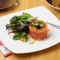 Spicy Tuna Salad · With spicy mayo, tempura crumbs, tobiko, and mesclun greens.
