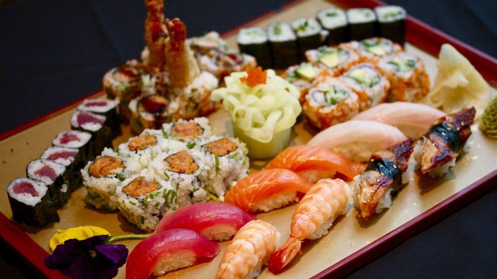 Sushi & Maki Combo(40 Pieces) · Sushi: tuna, salmon, water eel, white fish and cooked shrimp. Maki: California, tuna, shrimp tempura, cucumber and spicy tuna.