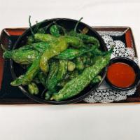 Shishito Peppers · Deep fried served with spicy garlic sauce.