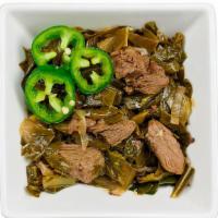 Gomen Bѐsiga · Medium spicy. Seasoned collard greens cooked with beef.