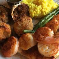 Seafood Combination · Broiled lobster tail, jumbo shrimp, sea scallops, clams casino, and lump crabmeat imperial s...