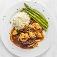 Filet Sinatra · Ten ounces chargrilled filet mignon topped with jumbo shrimp, lump crabmeat, and enjoyable m...