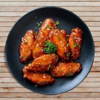 8 Pcs Chicken Wings · Classic Buffalo style chicken wings, in a choice of mild, medium or hot sauce comes with you...