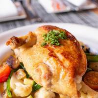 Brick Chicken · Free range chicken, rosemary roasted potatoes, vegetables, chicken demi
