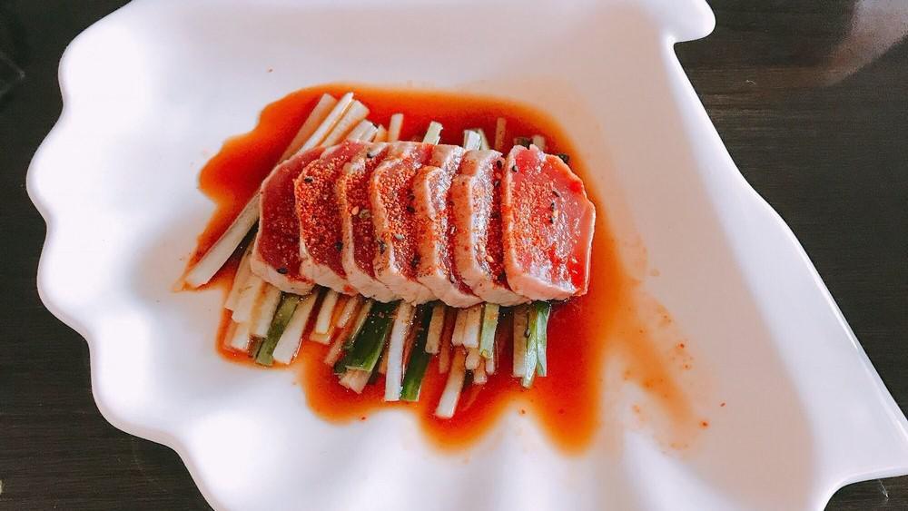Tuna Tataki · Spicy. Raw and uncooked. Tuna with chef's special chili sauce.