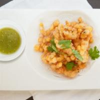 Corn Fritters With Green Tomato Sauce · Gluten free.