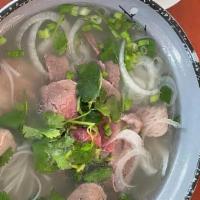 P1 Pho Deluxe · Pho (rice noodle) with Eye round steak, brisket & Meatball.