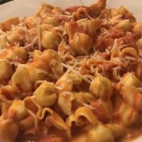 Pasta Pouches (Large) · In a vodka sauce.