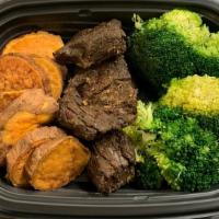 #13. Marinated Grilled Sirloin Tips · Served with roasted sweet potato and steamed broccoli.