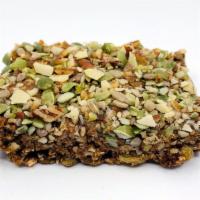 Breakfast Nut Bar  · A blend of pecans sunflower, almonds, pumpkin seeds, and raisins in a blend of organic almon...