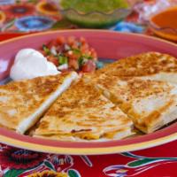 Veggies Quesadilla · Poblano peppers, grilled corn, onions, tomatoes, and nopales. In a 10