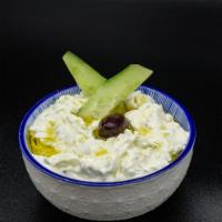Tzatziki · Greek yogurt, cucumber, garlic, and seasoning. Vegetarian.