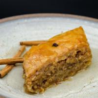 Baklava · Layers and layers of filo pastry with chopped walnuts and sweet honey.